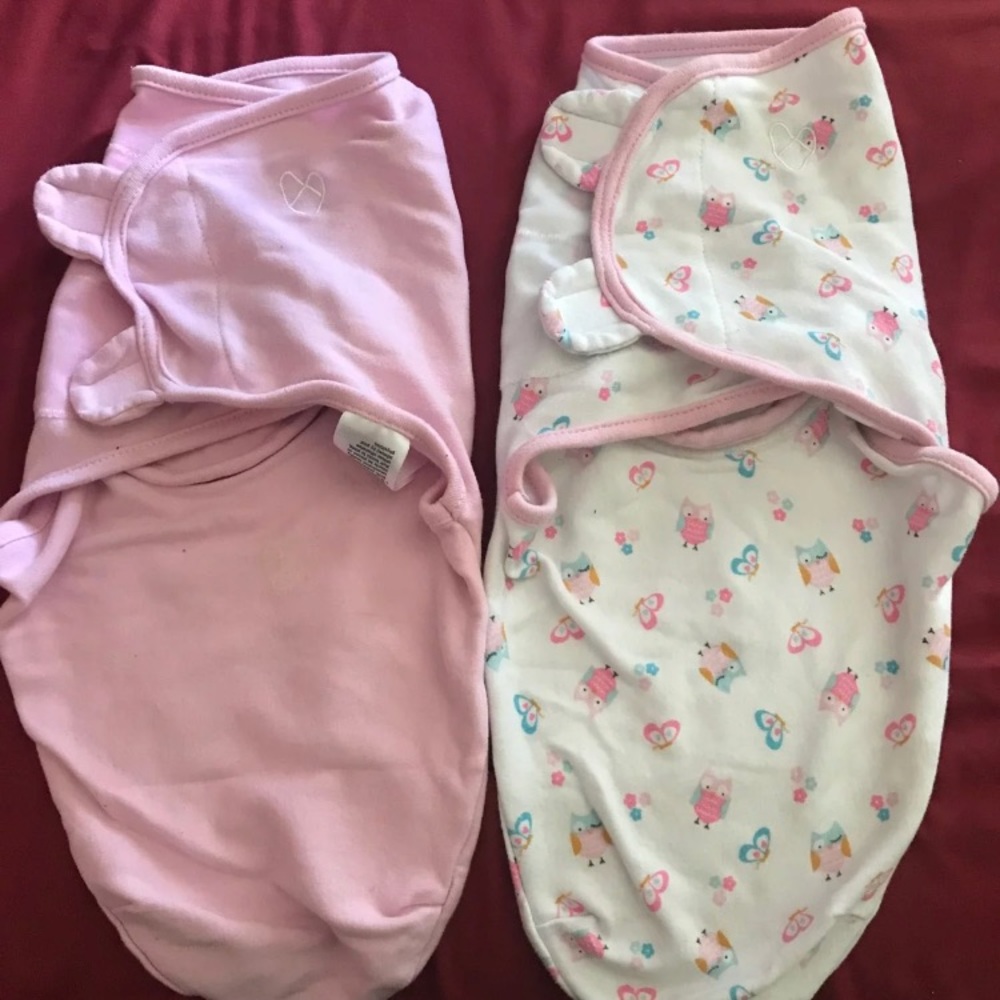 Infant Girl swaddles